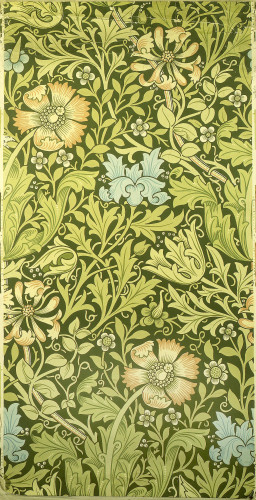 Light green foliage on dark green ground with blue and pink flower