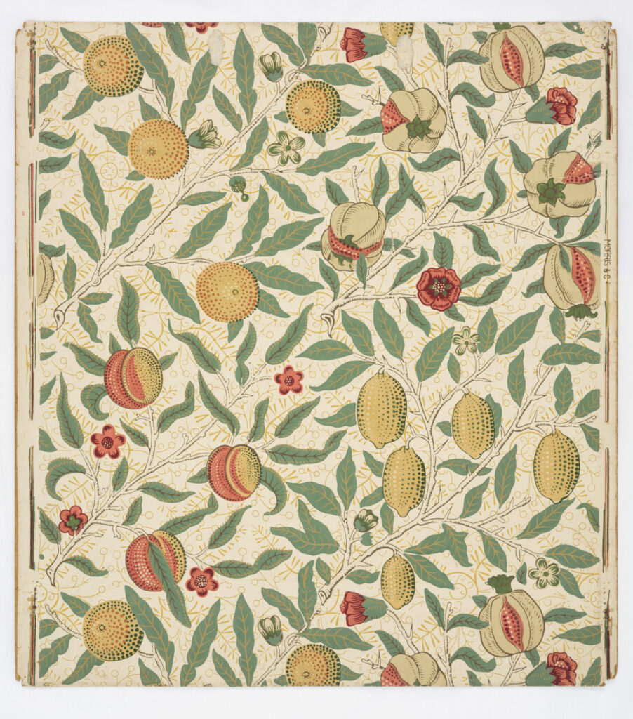 Four fruits including lemons and pomegranates