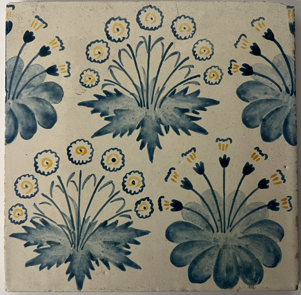 Square tile depicting clumps of daisies